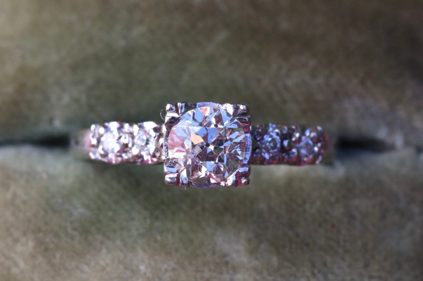 Three quarter (.75) ctw old cut diamonds set in fishtail prongs in 14k white gold size 5.75 (sizable)