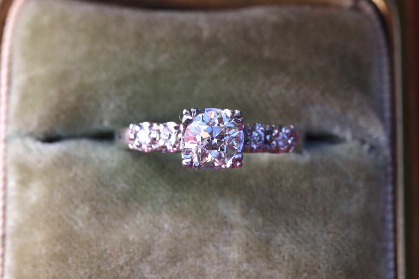 Three quarter (.75) ctw old cut diamonds set in fishtail prongs in 14k white gold size 5.75 (sizable)