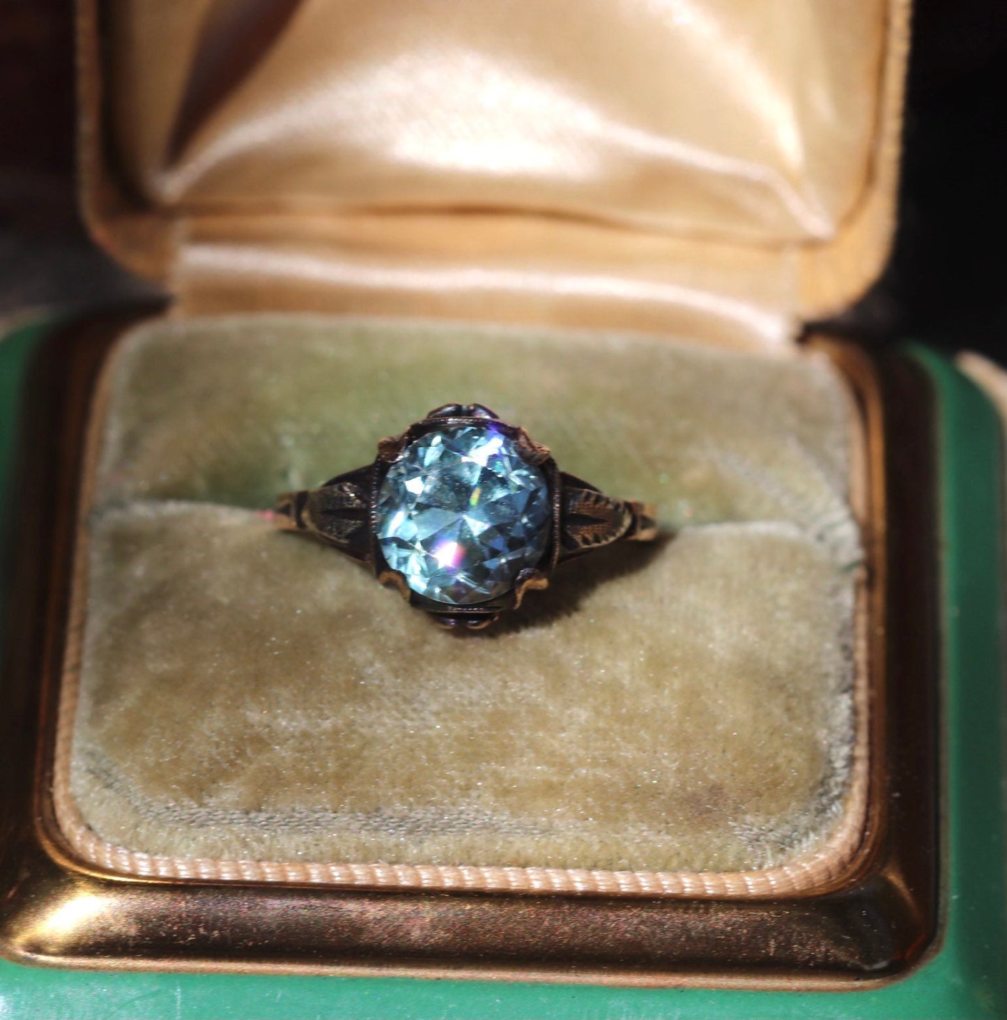 Blue topaz set in 10 karat gold size 7 sizable