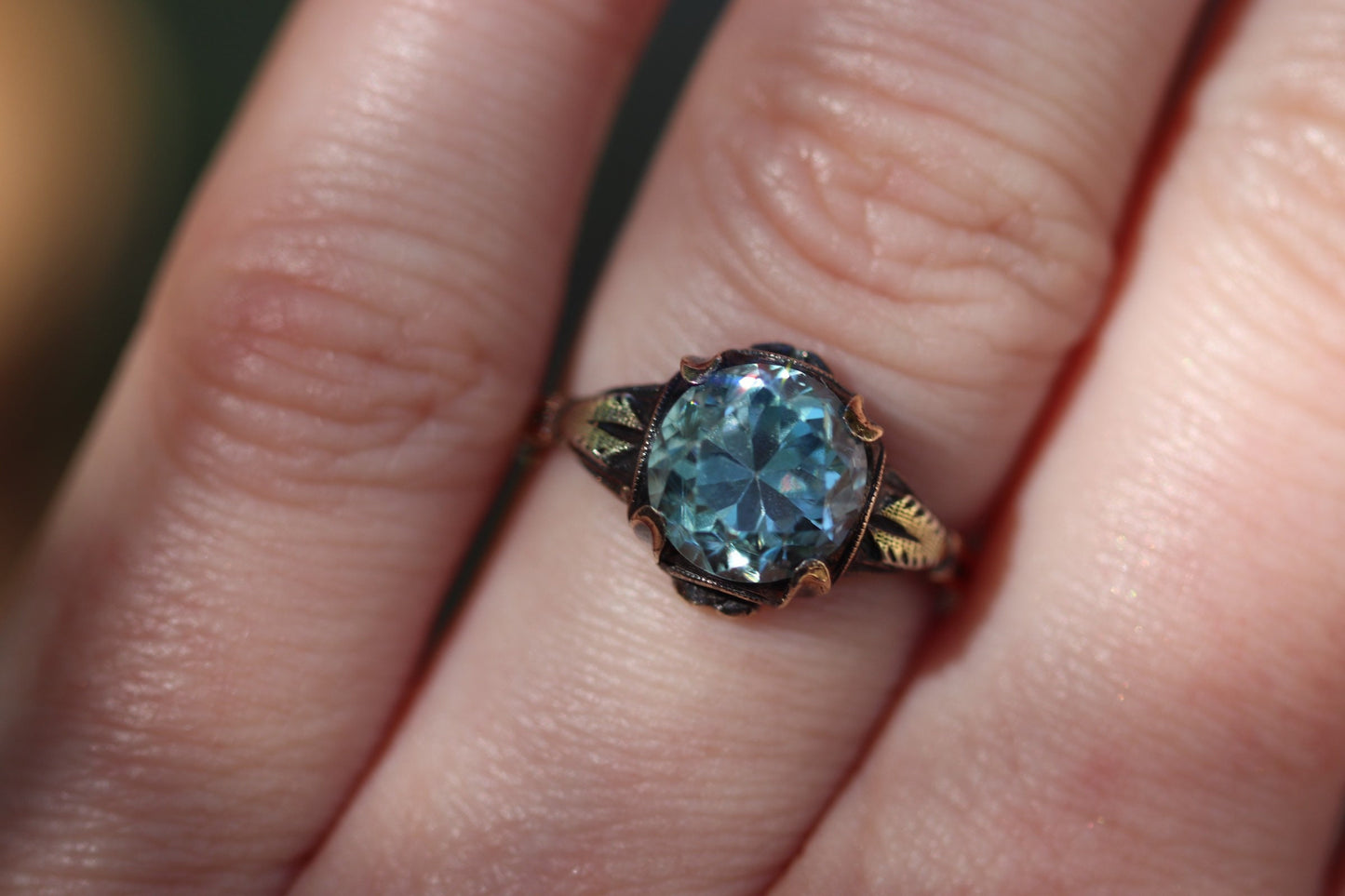 Blue topaz set in 10 karat gold size 7 sizable