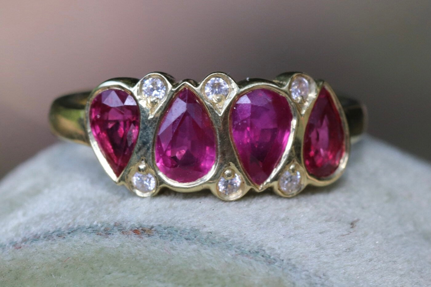 2.11 carat unheated rubies and .08 GVS diamond set an 18 K size 6.5 (sizable)