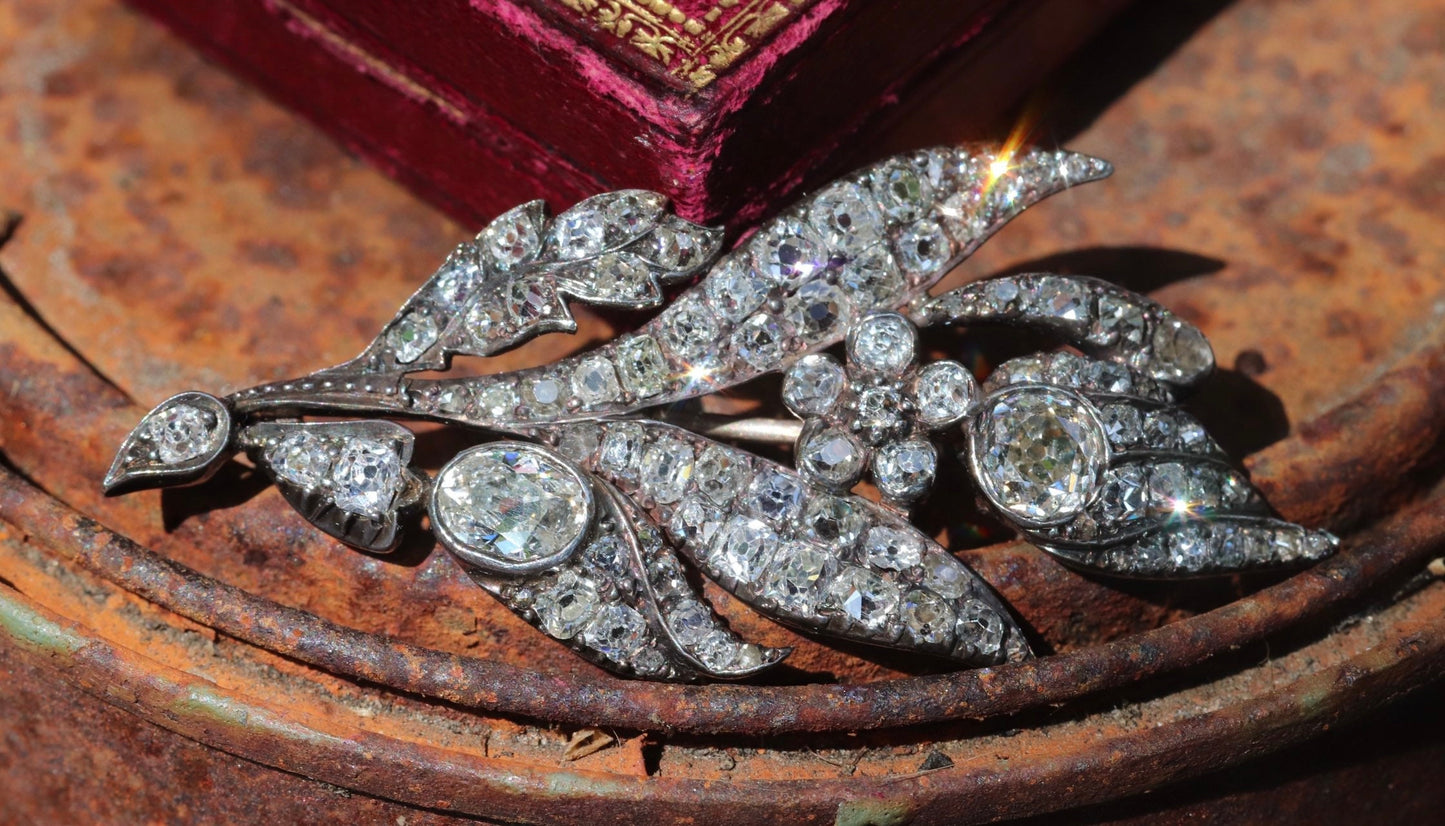 Antique Old cut diamond brooch set in silver and 18k yellow gold