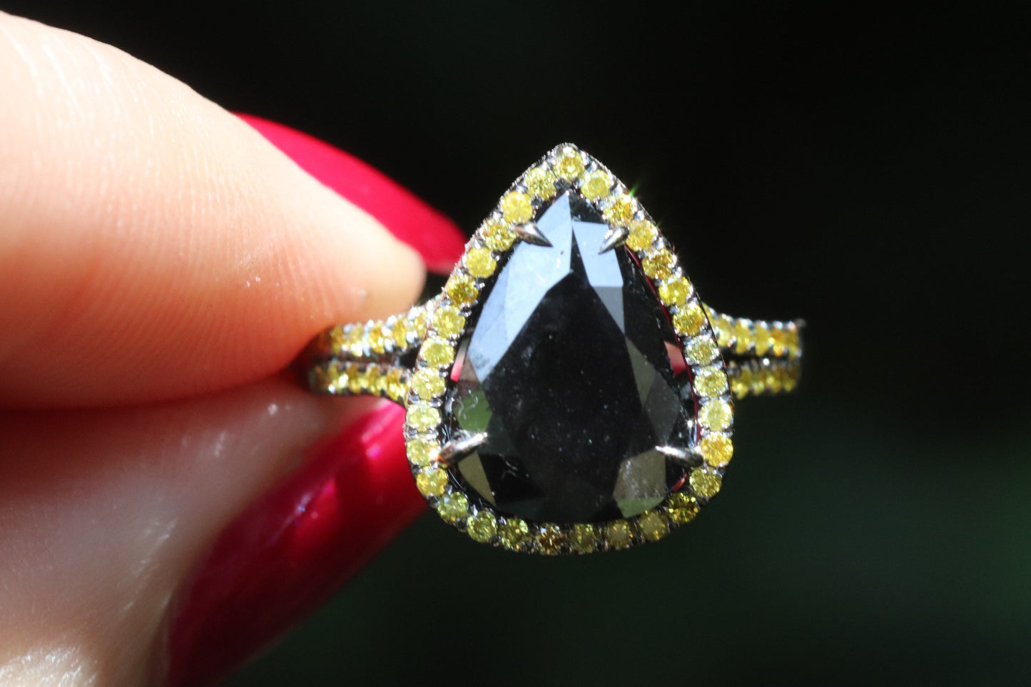 Black and yellow diamond pear-shaped engagement ring in 14 karat black gold size 6.5