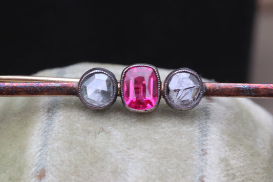 Synthetic ruby and rose cut diamond three stone pin set in 14 karat rose gold
