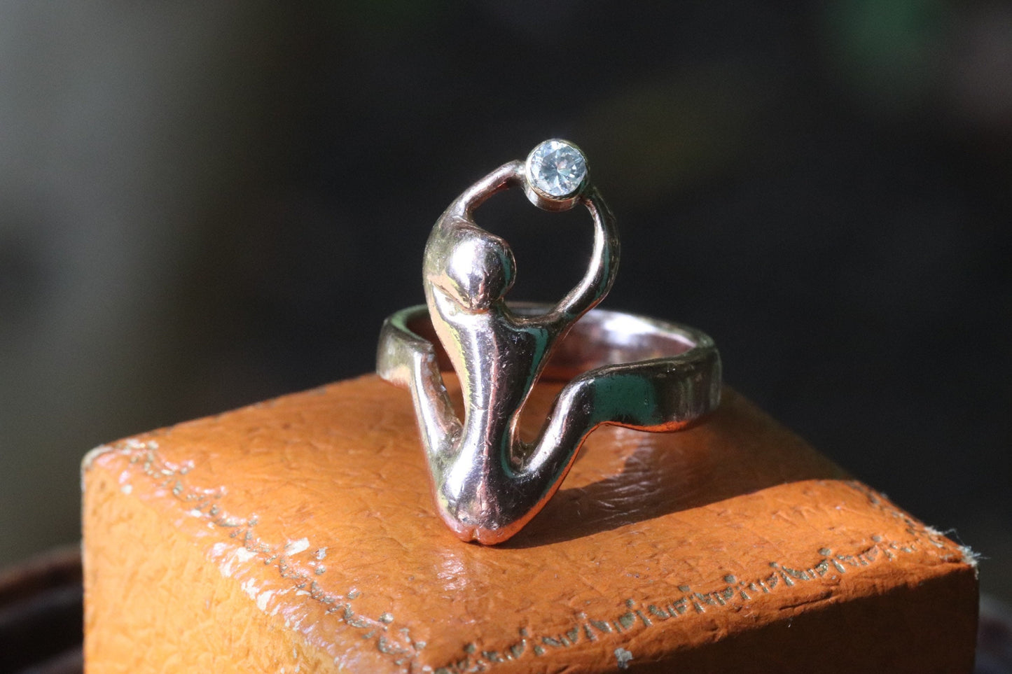 9ct rose gold naked woman holding a diamond ring size 7.25 (sizable)