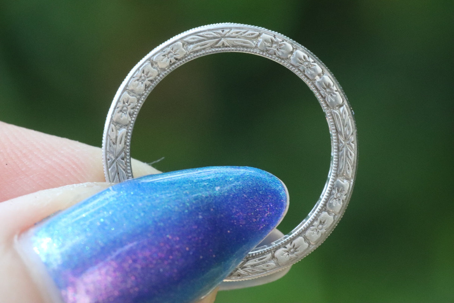 Engraved carre cut diamond eternity band set in platinum size 5