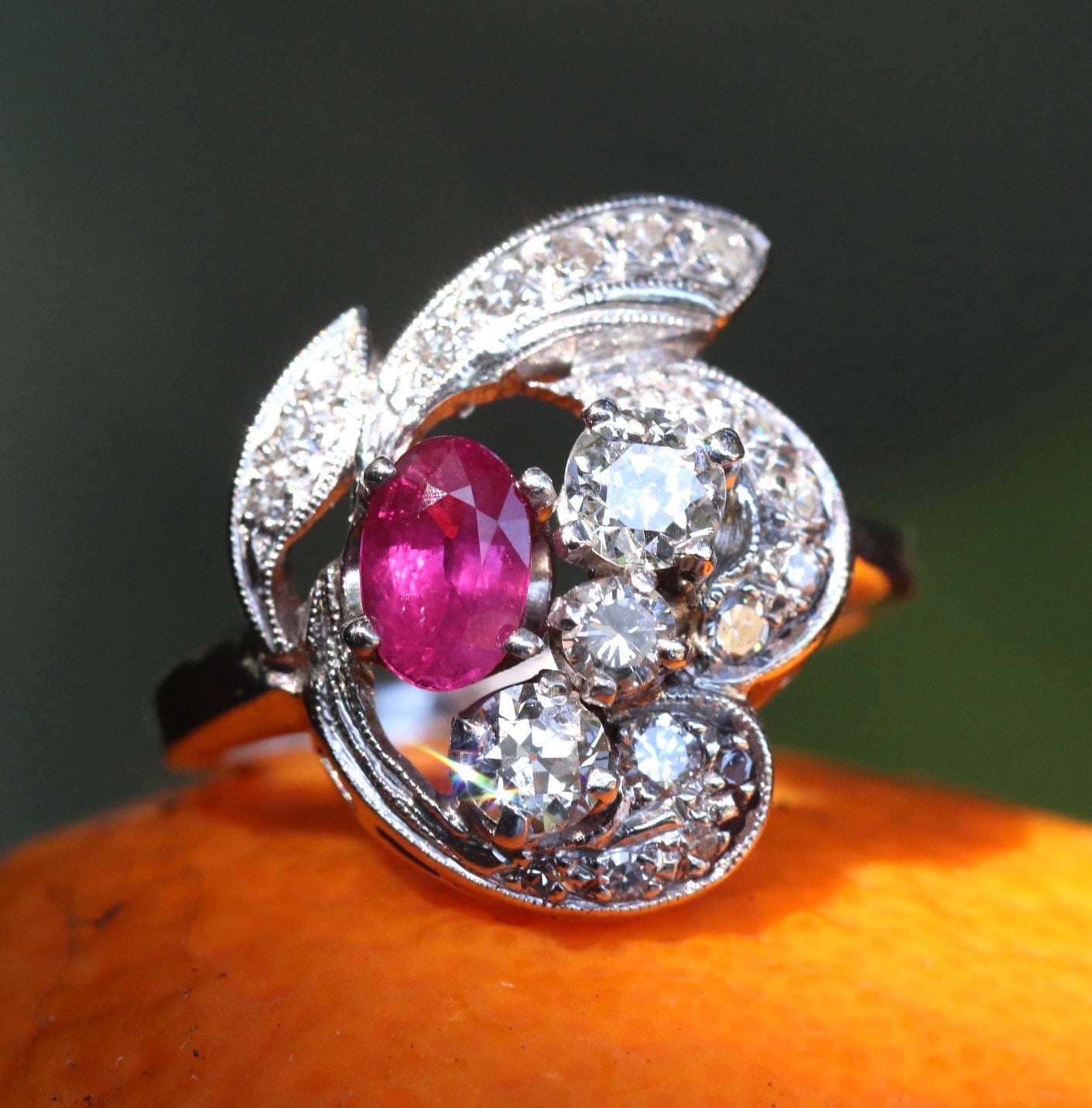 1950s ruby and old European cut diamond cocktail ring set in 14k white gold