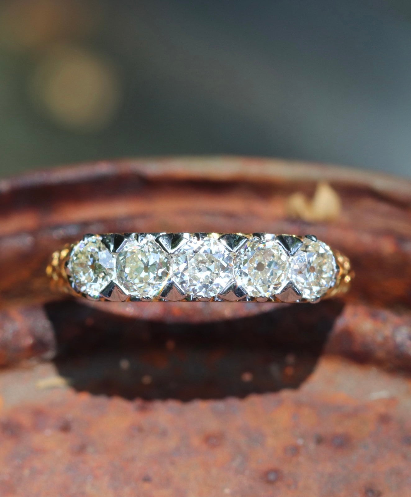 5-stone old mine cut diamond ring set in 18k yellow gold
