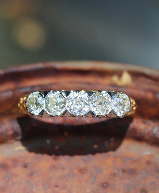 5-stone old mine cut diamond ring set in 18k yellow gold