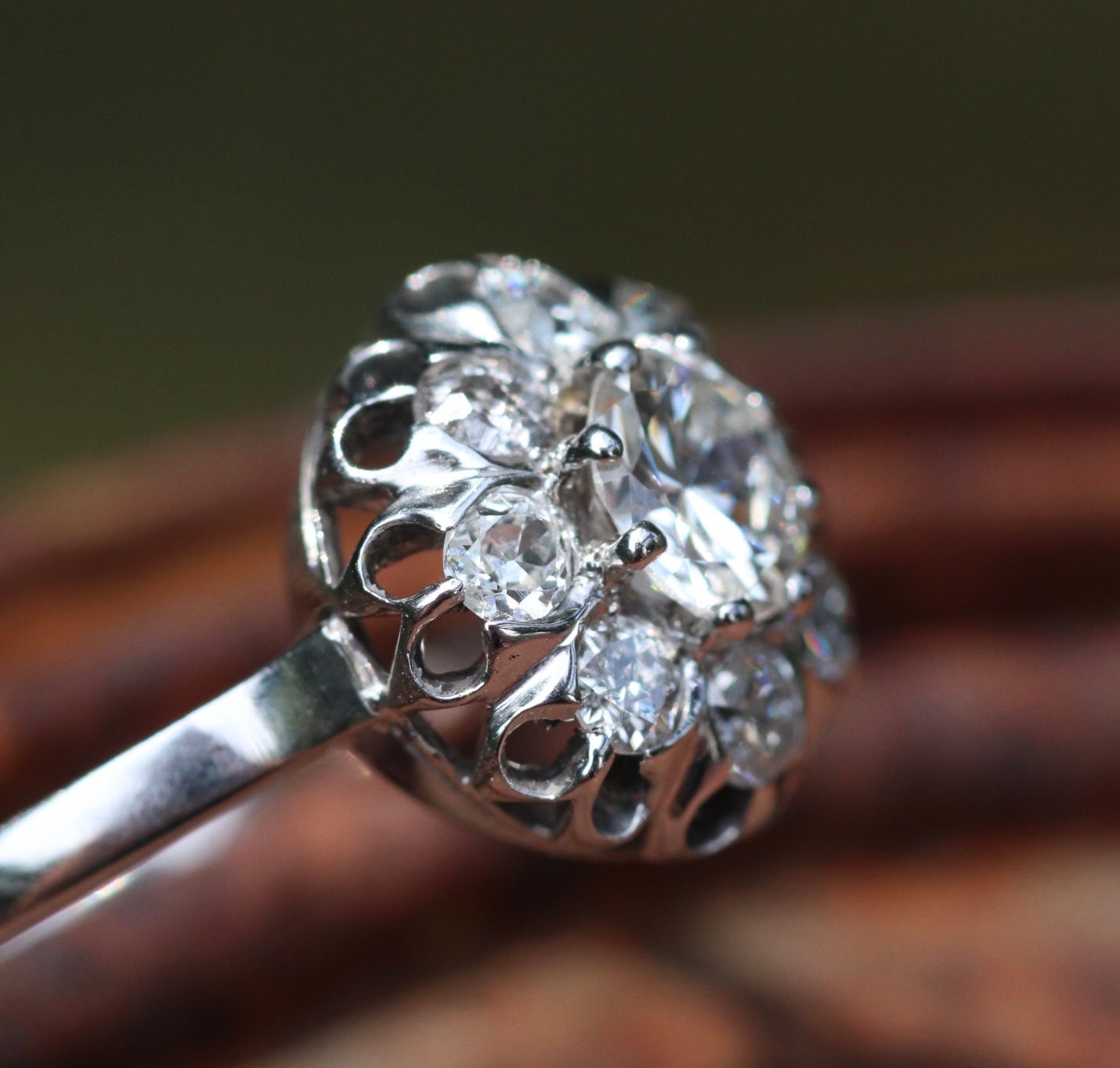 Approximately 1.75 ctw antique diamond cluster ring Set in 18k white gold