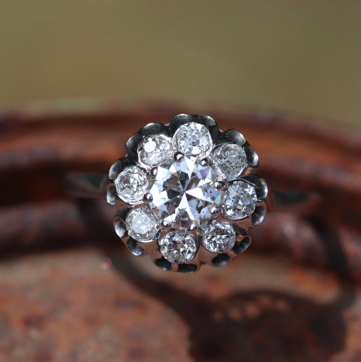 Approximately 1.75 ctw antique diamond cluster ring Set in 18k white gold