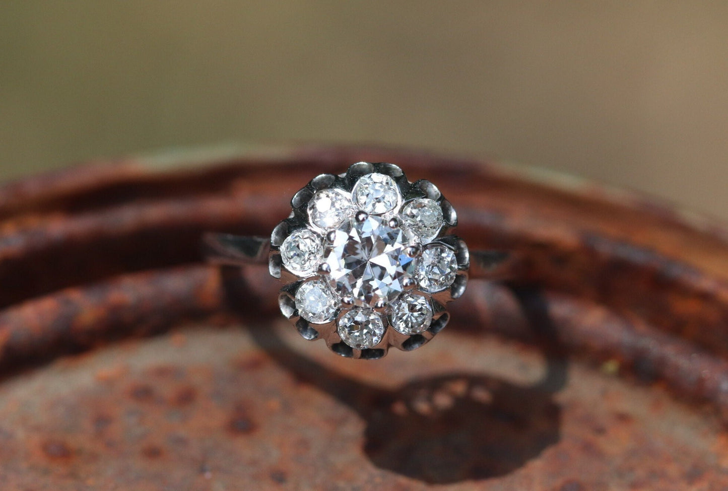 Approximately 1.75 ctw antique diamond cluster ring Set in 18k white gold