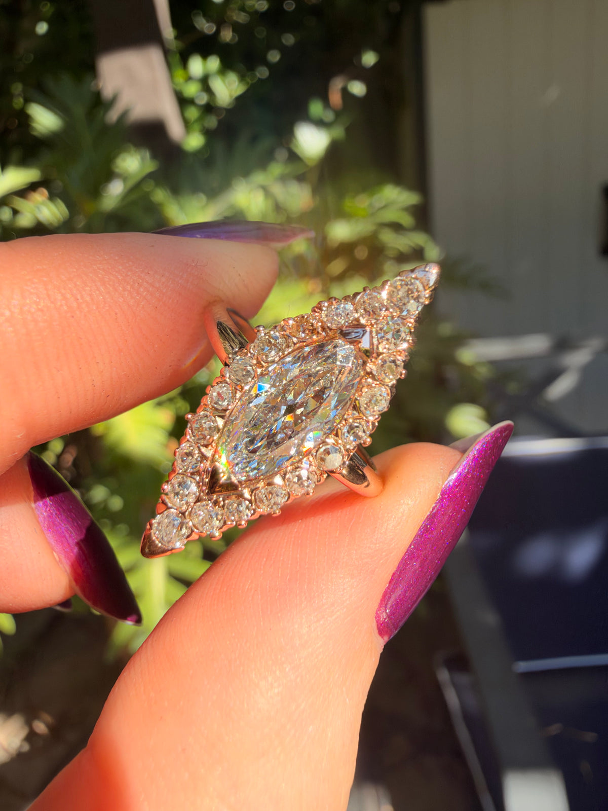 Victorian navette diamond ring with antique moval center