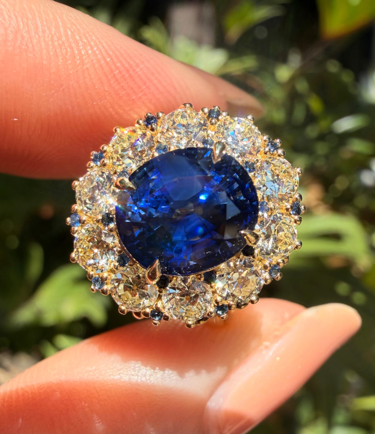 “Royal Blue” GIA certified natural sapphire and old European cut diamond halo  Gilded Lane Design