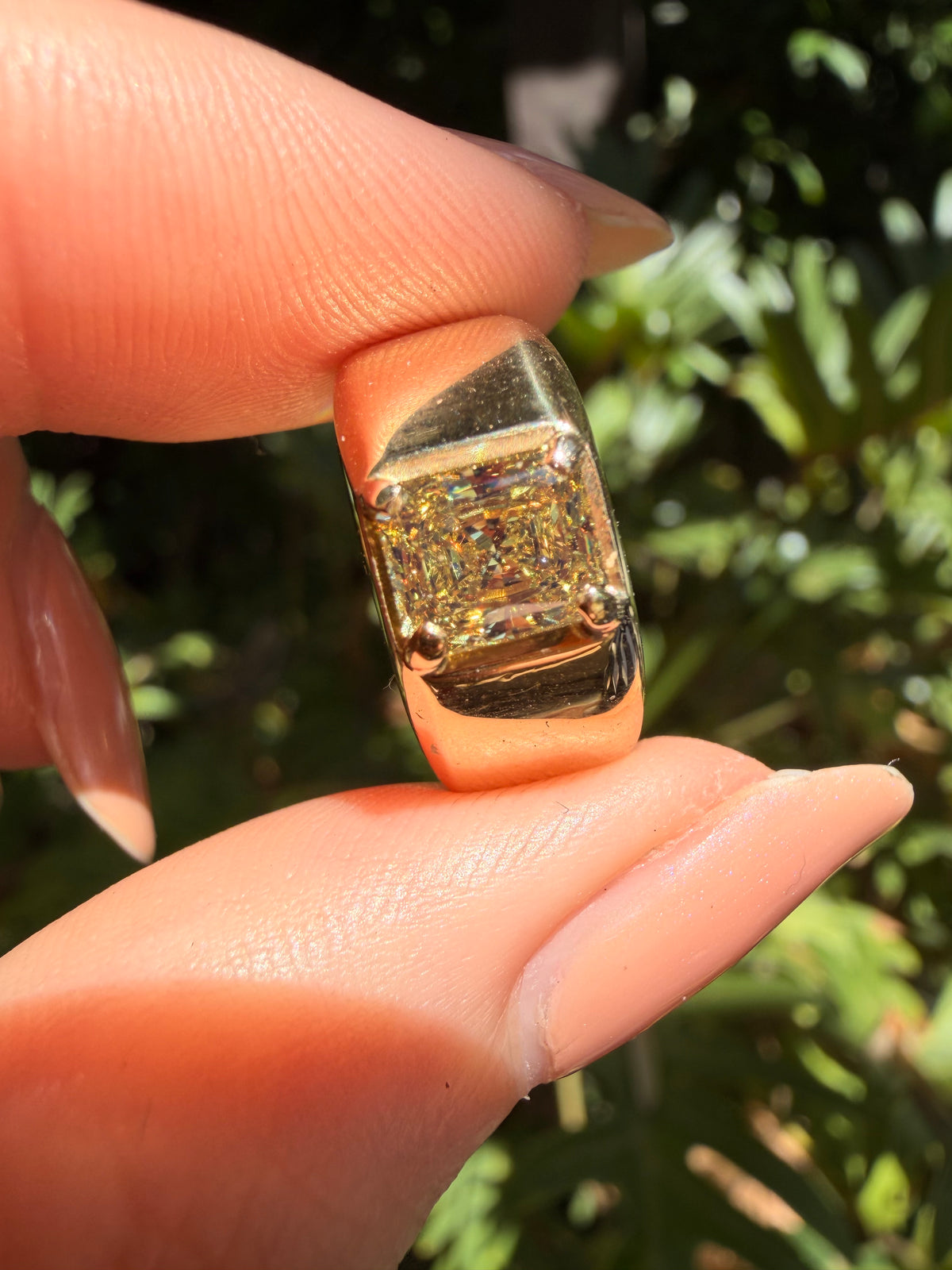 Neiman Marcus fancy intense yellow diamond ring in 18 karat yellow gold