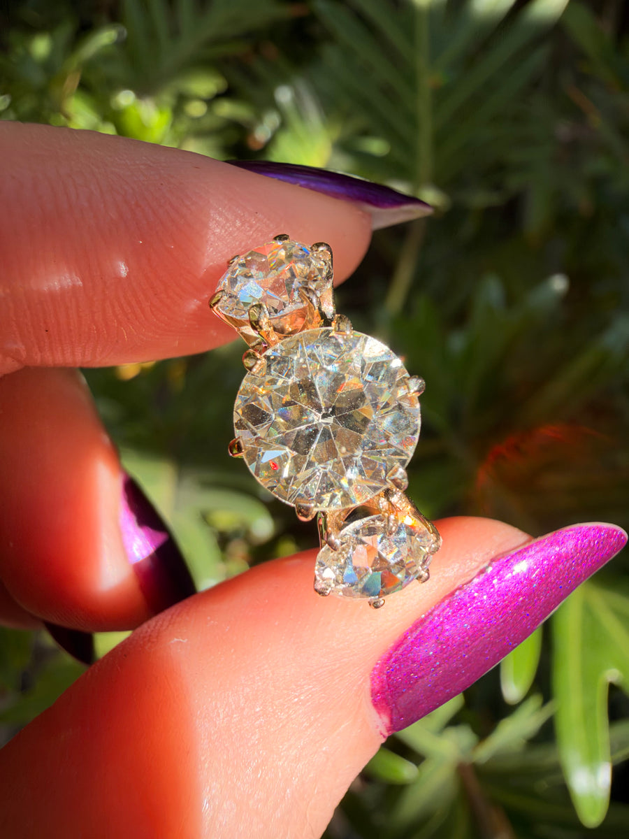 Antique old European cut and old mine cut diamond three stone
