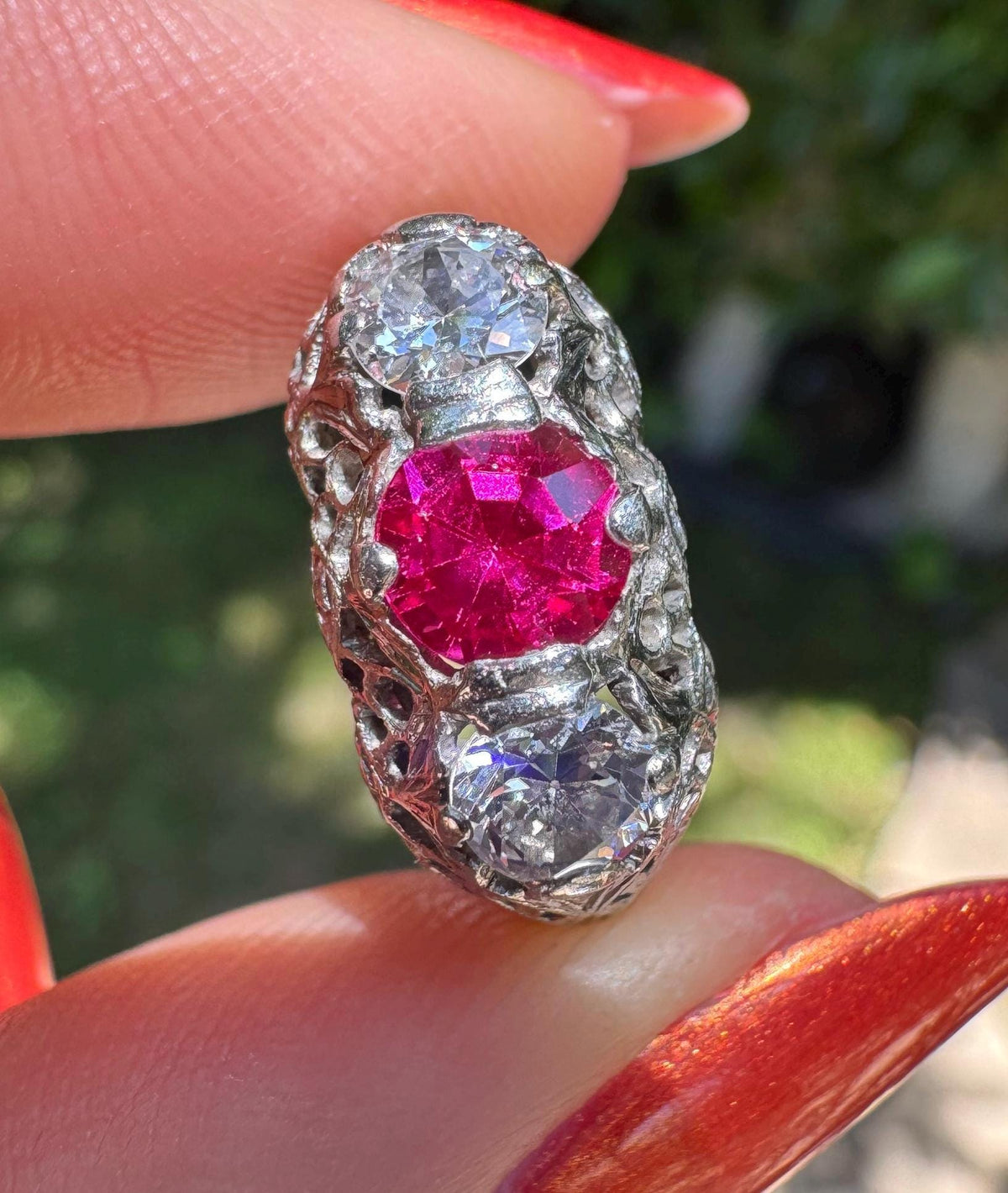 Synthetic ruby and old mine cut diamond ring set in platinum
