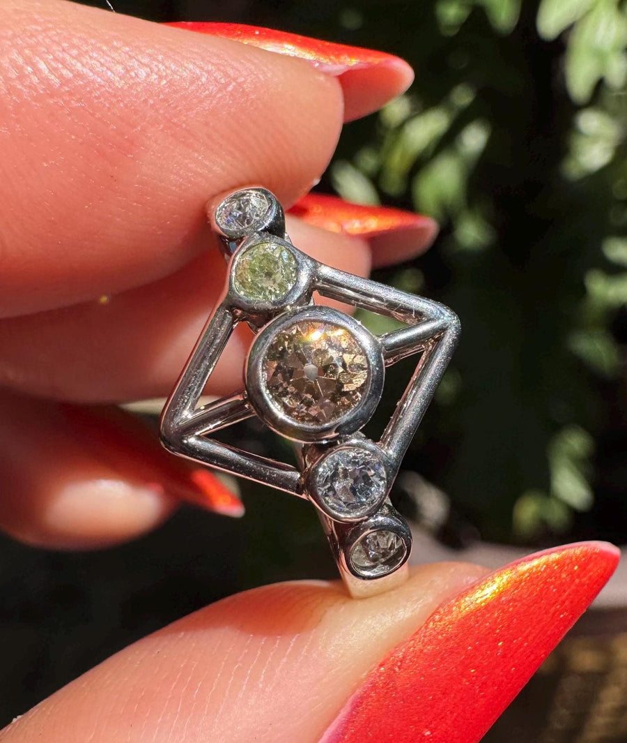 Natural fancy colored diamond ring set in platinum