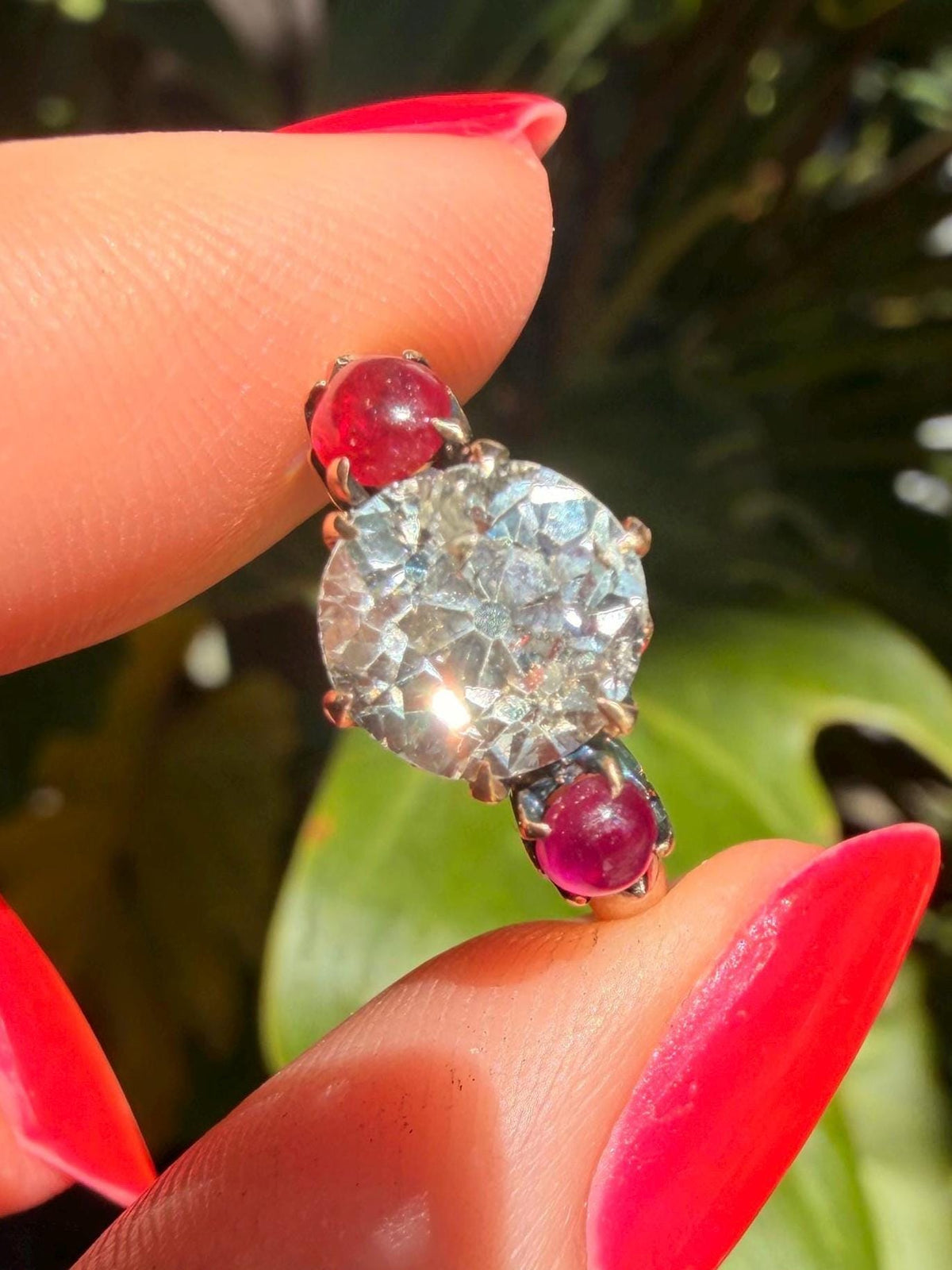 Victorian antique 2.6 carat old mine cut diamond ring with natural ruby sides