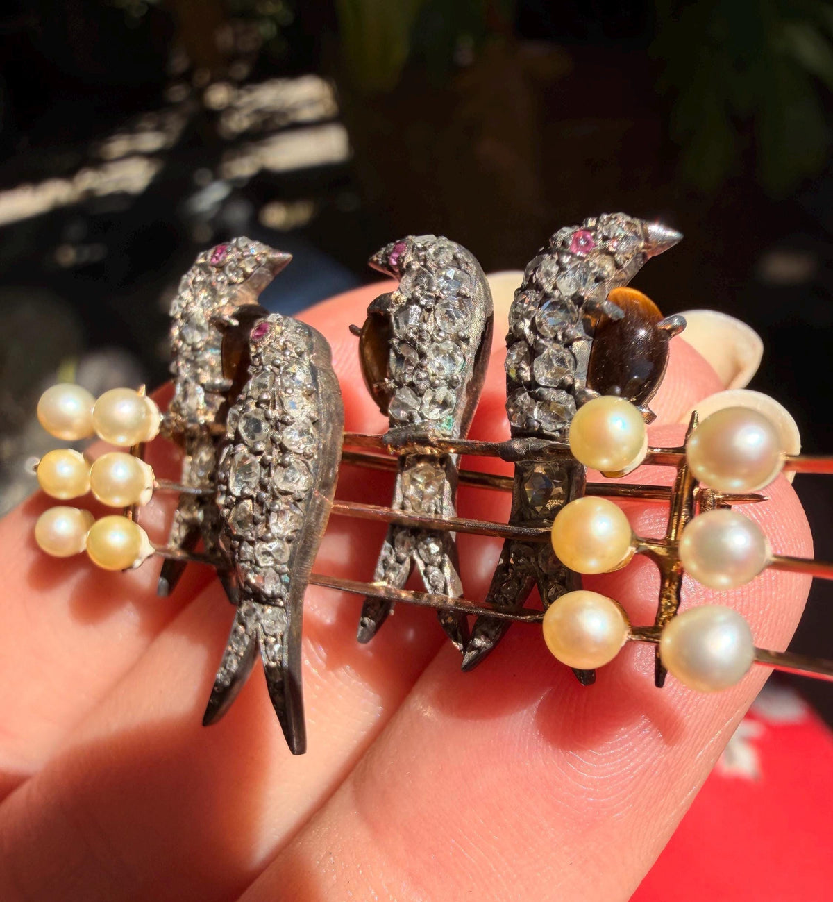 Antique bird brooch with tigers eye quartz and old mine cut diamond diamonds