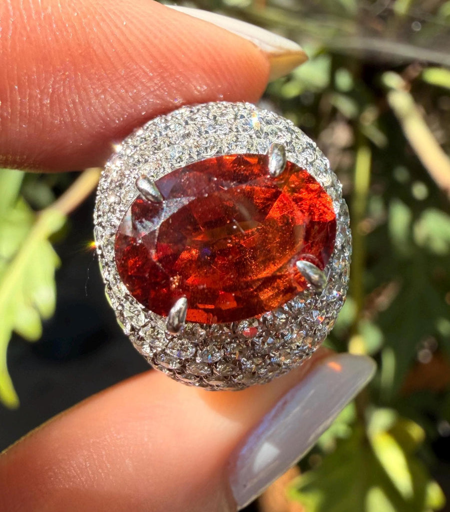 Spessertine garnet and diamond ring and 18 karat white gold