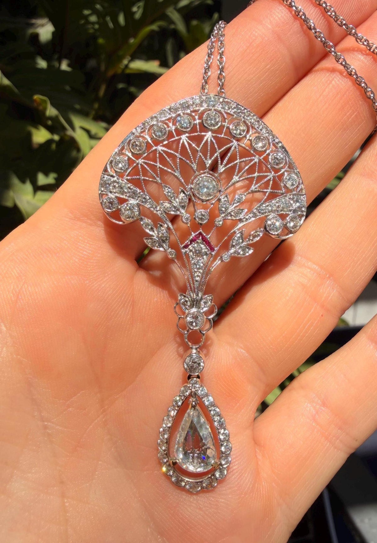 Antique inspired diamond and ruby necklace in 18k white gold