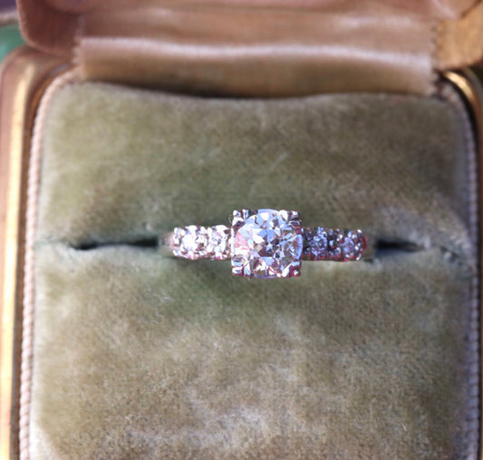 Three quarter (.75) ctw old cut diamonds set in fishtail prongs in 14k white gold size 5.75 (sizable)
