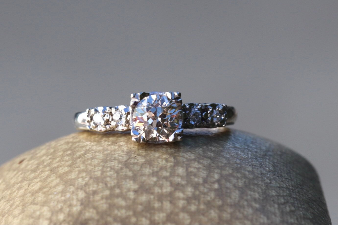 Three quarter (.75) ctw old cut diamonds set in fishtail prongs in 14k white gold size 5.75 (sizable)