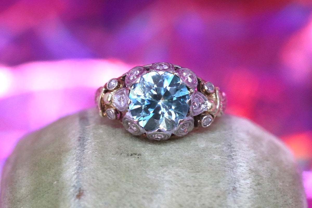 14k blue zircon and diamond ring set in 14k yellow gold size 6
