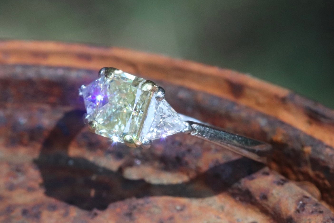 Yellow diamond radiant and diamond trapezoid three stone engagement ring set in platinum size 6 (sizable)