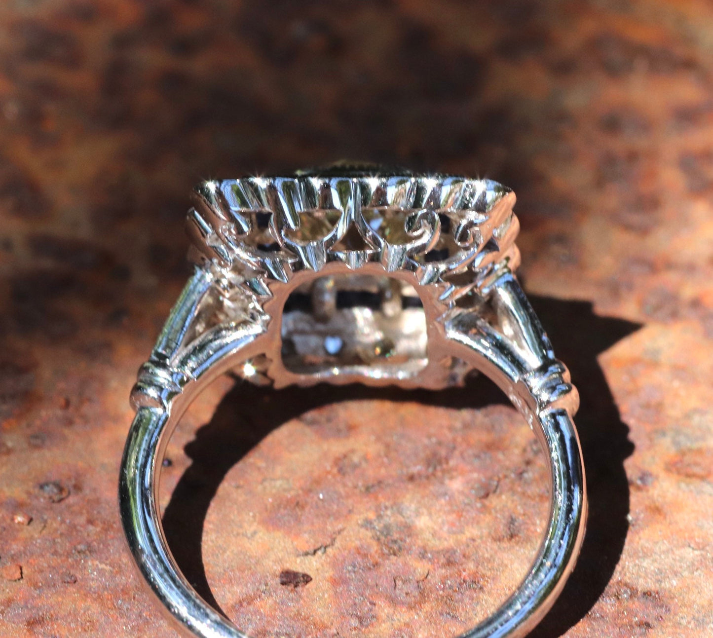 Art Deco inspired old mine cut diamond and French cut sapphire ring in 14k white gold