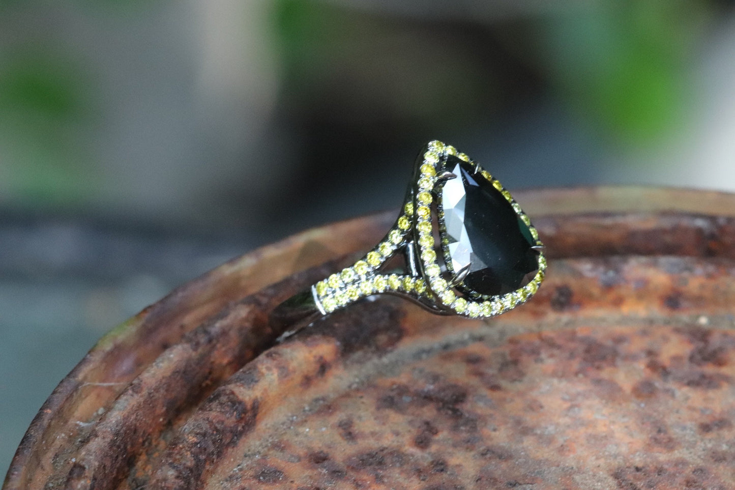 Black and yellow diamond pear-shaped engagement ring in 14 karat black gold size 6.5