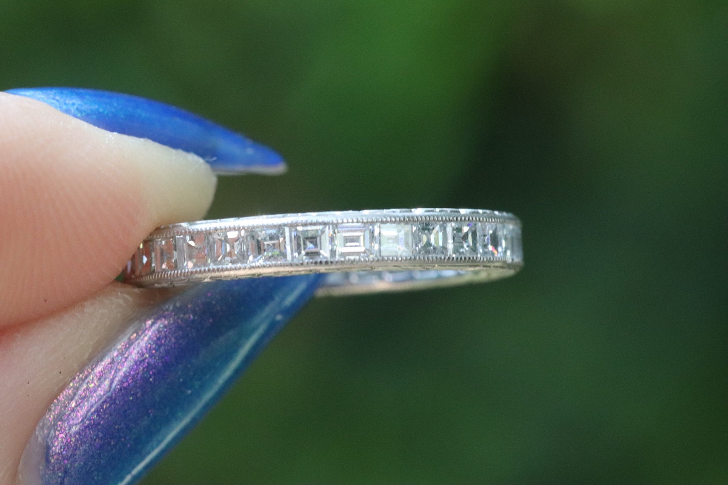 Engraved carre cut diamond eternity band set in platinum size 5