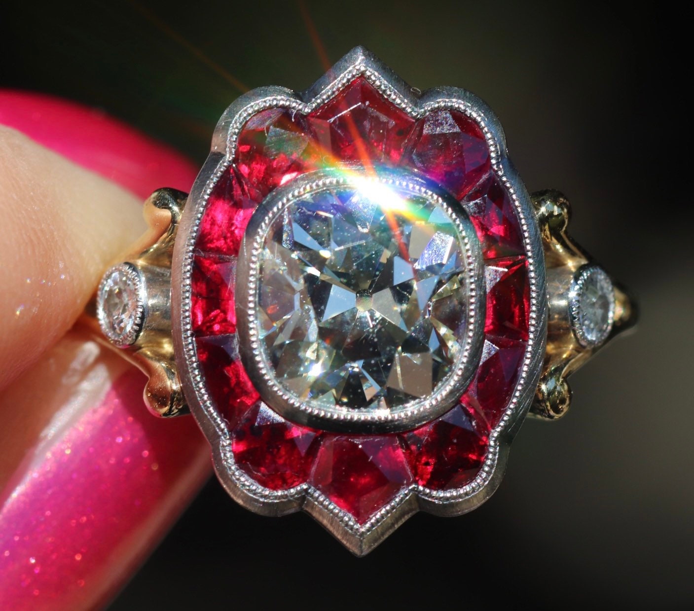 GIA certified old mine cut diamond with natural ruby halo in hand forged customs ring