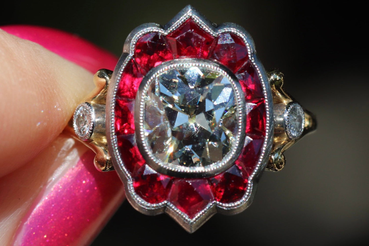 GIA certified old mine cut diamond with natural ruby halo in hand forged customs ring