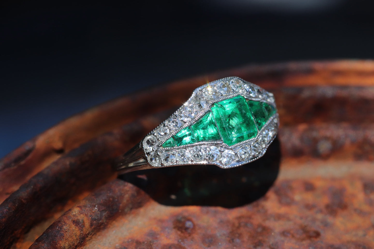True antique Art Deco emerald and diamond ring set in platinum
