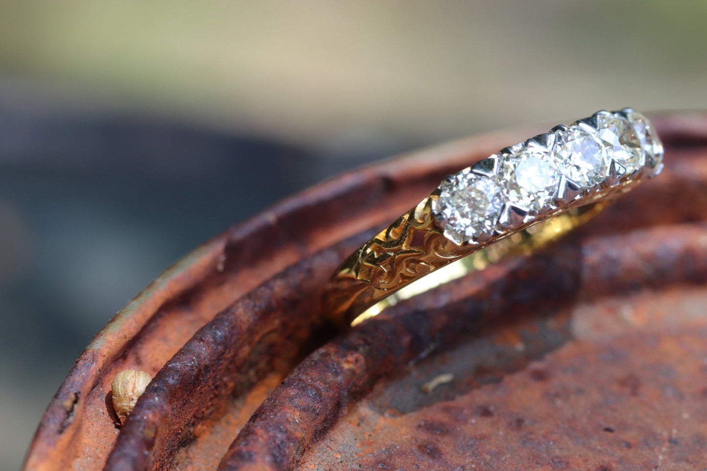 5-stone old mine cut diamond ring set in 18k yellow gold