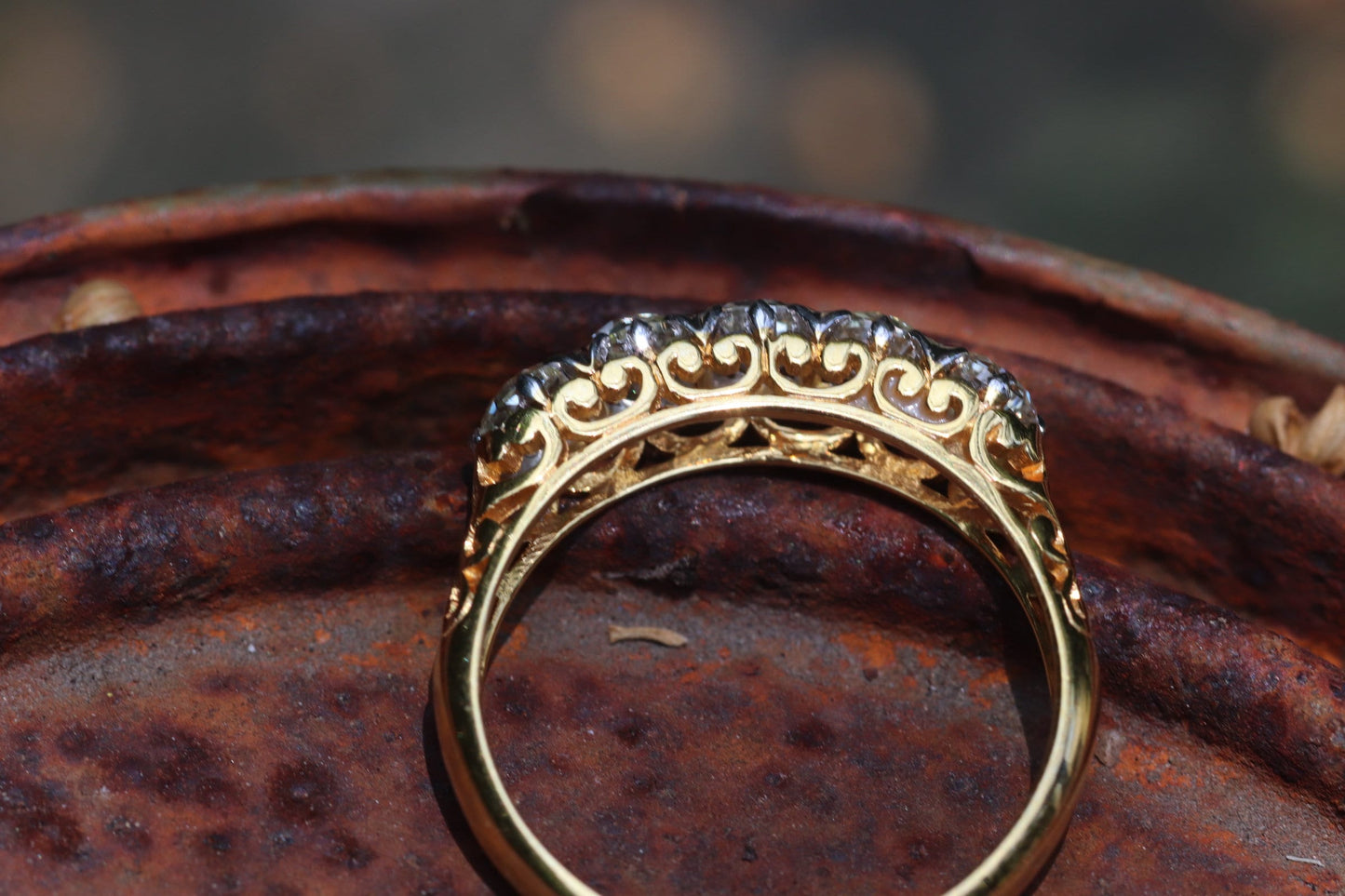 5-stone old mine cut diamond ring set in 18k yellow gold
