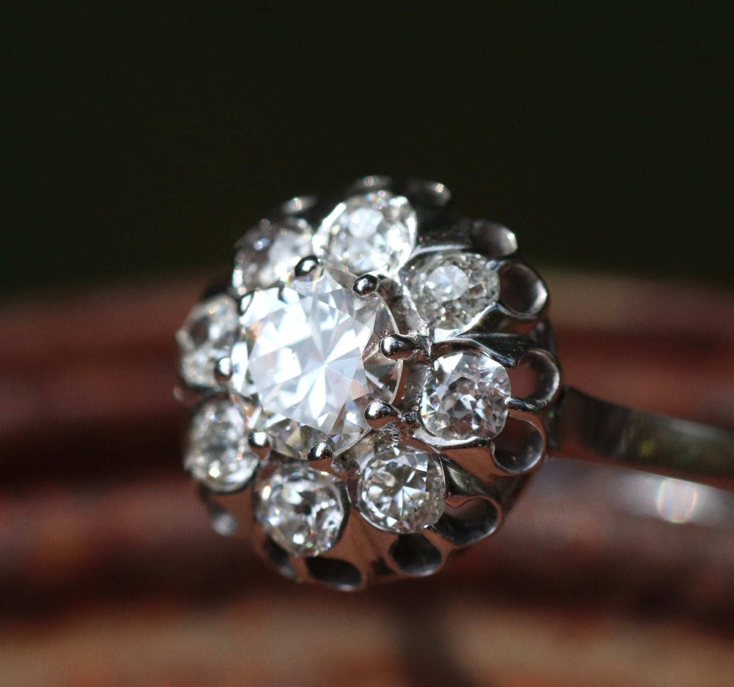 Approximately 1.75 ctw antique diamond cluster ring Set in 18k white gold